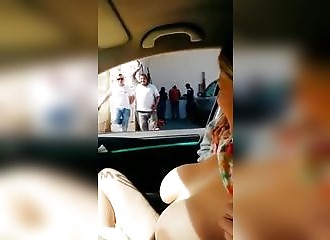 Happy to show her big tits to the workers!