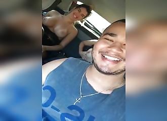 2 friends flashing tits on backseat