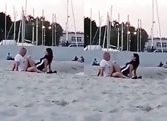 Couple caught on the beach