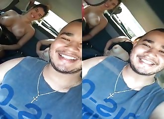 2 friends flashing tits on backseat