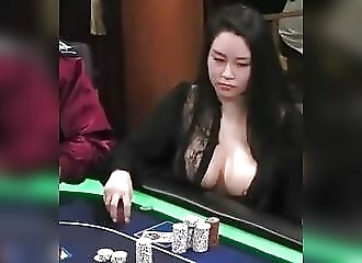 Oops, her boob pops out during a poker tournament!